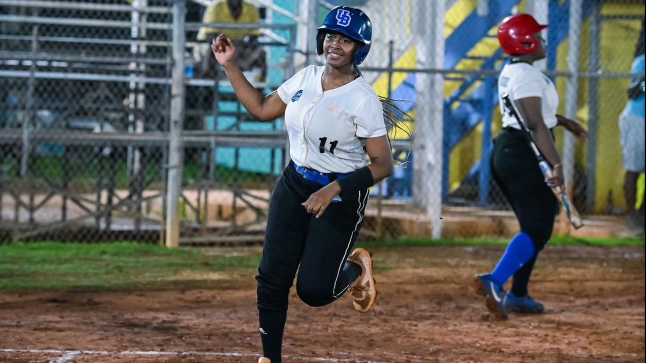 The Mingoes' Solana Brown crosses home plate to help the Mingoes take down the Cyber Tech Blue Marlins 24-8 for their first win of the season in the New Providence Softball Association league.